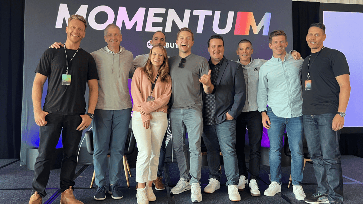 Fluent and Rebuy post on stage at Momentum 2025