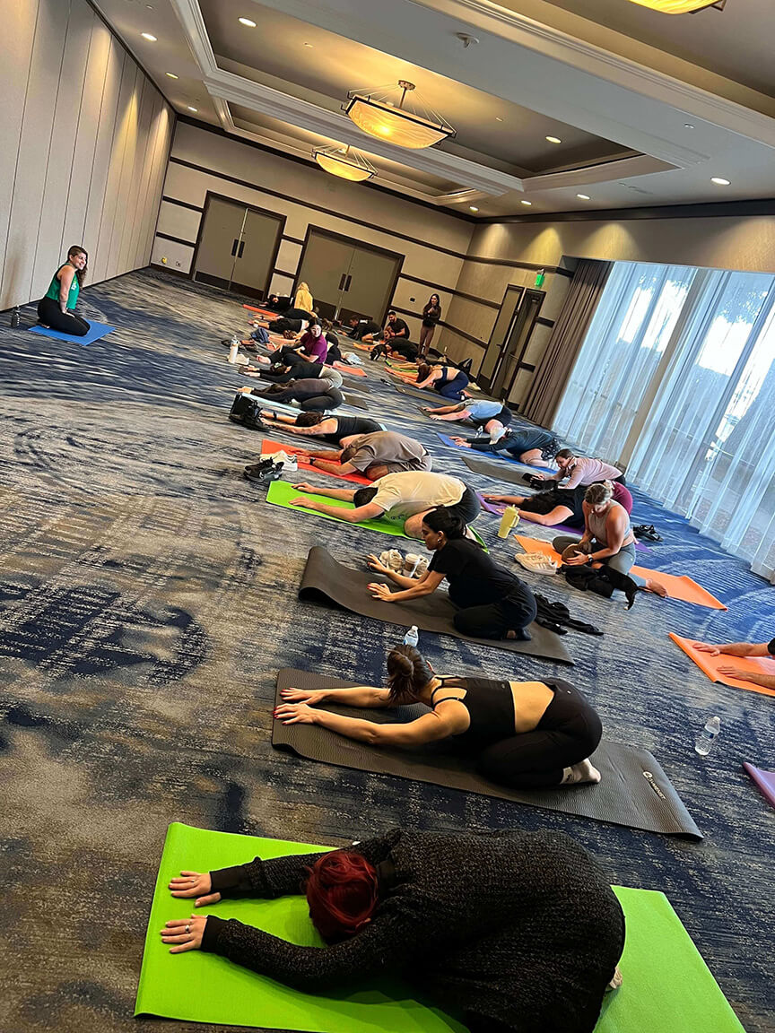 puppy yoga at Momentum 2025